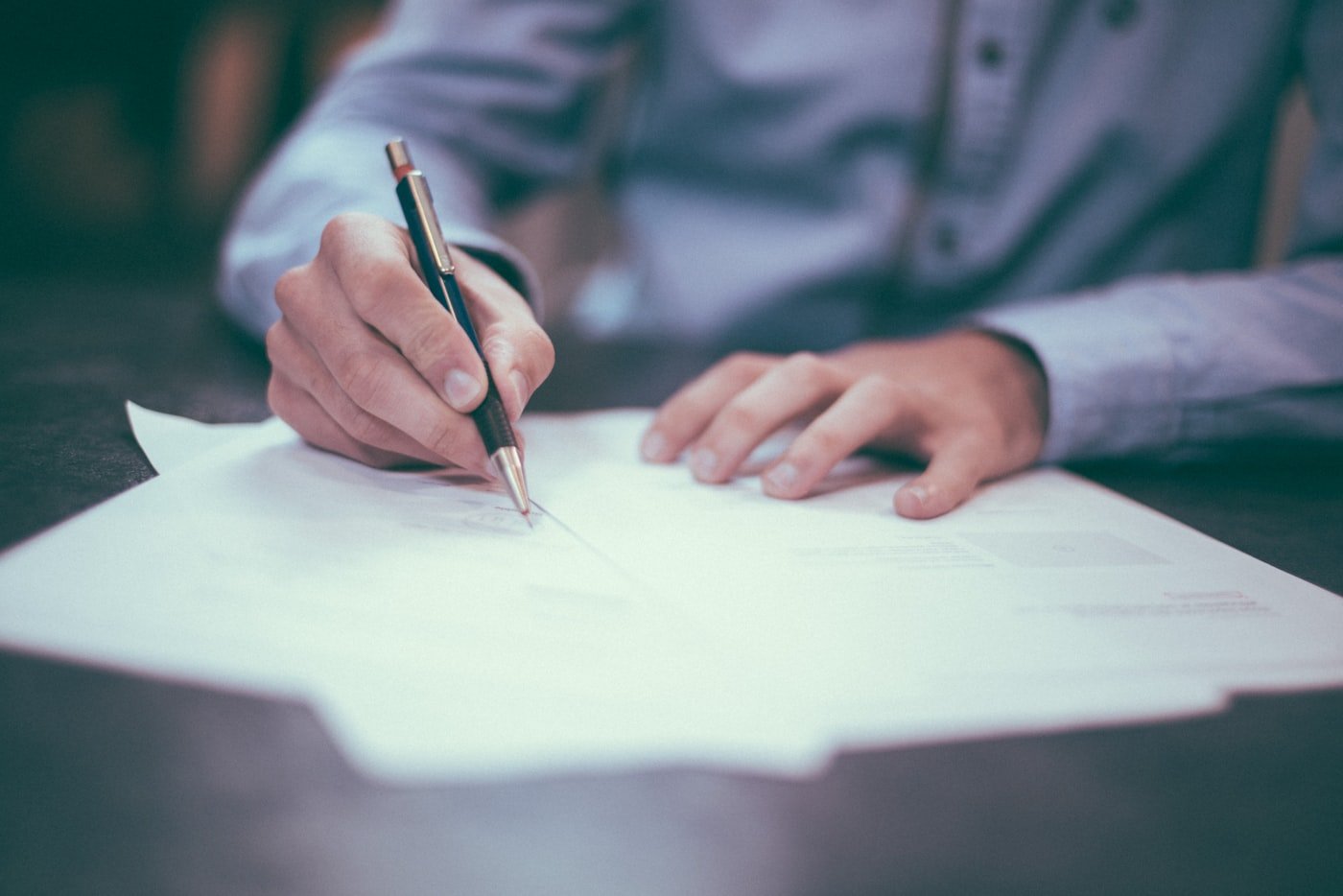 Legal documents and compliance paperwork on a desk